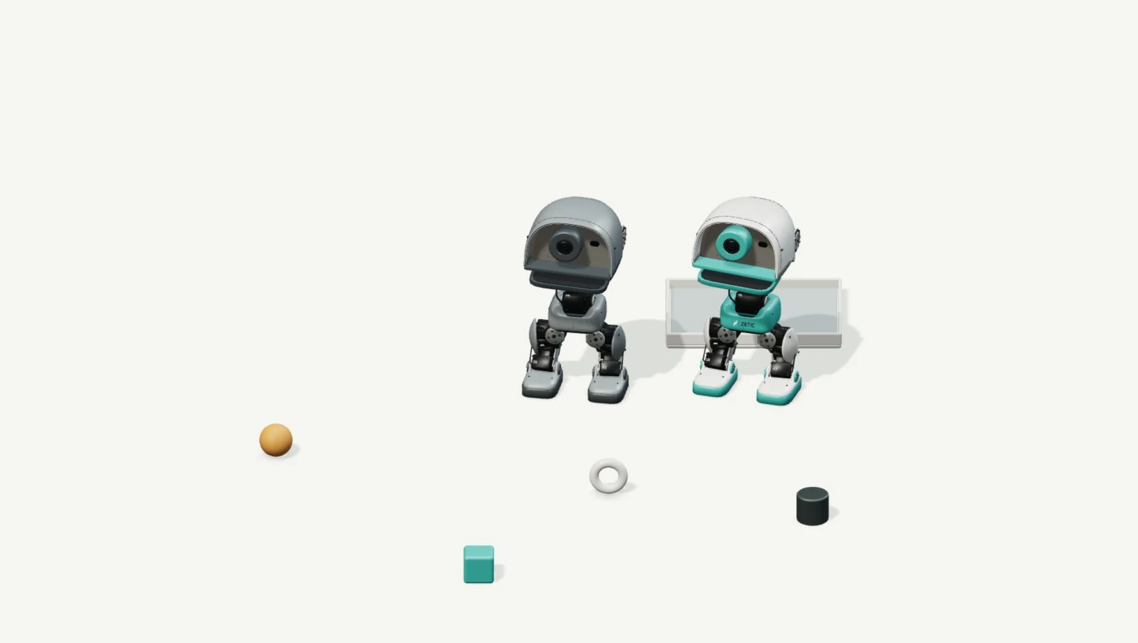 A gray baseline robot and a teal ZETIC optimized robot beside four pickup objects